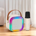 Portable speaker with rainbow gradient and microphone on a wooden surface - Lebtech Store