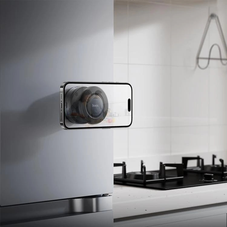 Smartphone displaying a kitchen scene with a stove on a white tiled wall - Lebtech store