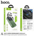 Front and back retail packaging of the Hoco DB07A Intelligent Balance 20000mAh Power Bank, available at LebTech Store Lebanon. The box highlights its massive 20,000mAh capacity, four built-in charging cables (Micro-USB, Lightning, Type-C, and USB-A), and a large LED digital display.
