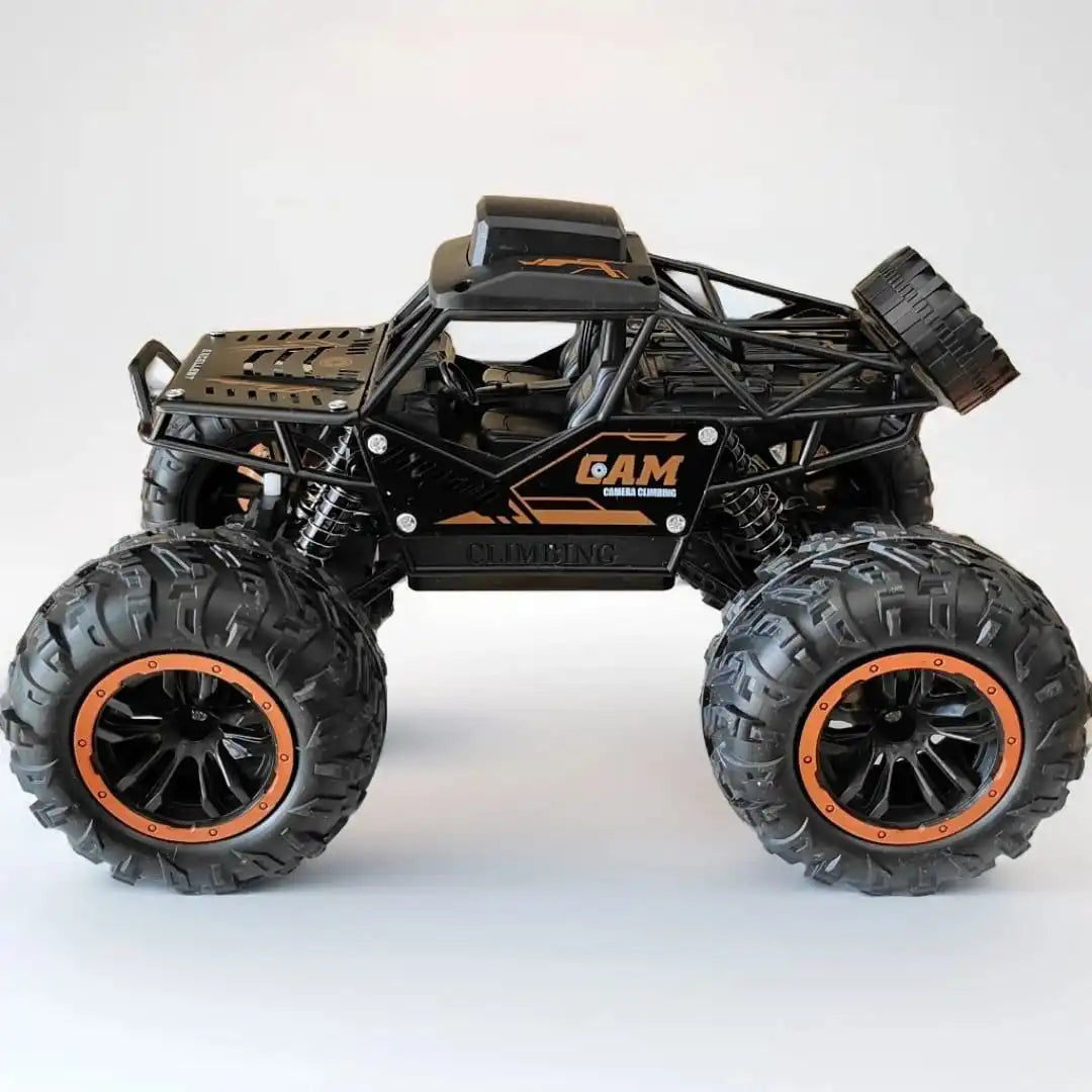 Toy monster truck with large wheels on a white background
