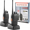 A retail package display of the Baofeng BF-888S portable two-way radio set showing two black walkie talkies sitting in their desktop charging cradles next to the official product box, available at Lebtech Store with fast delivery across Lebanon.