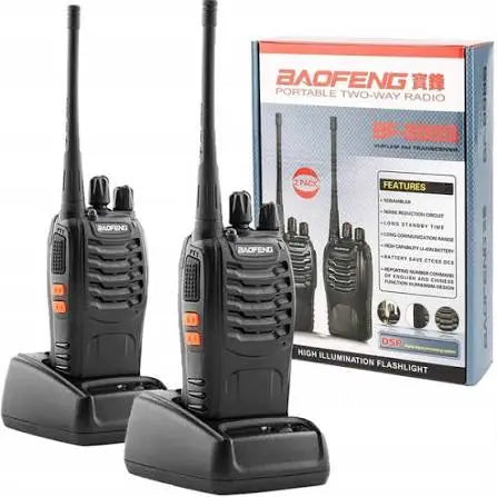 A retail package display of the Baofeng BF-888S portable two-way radio set showing two black walkie talkies sitting in their desktop charging cradles next to the official product box, available at Lebtech Store with fast delivery across Lebanon.
