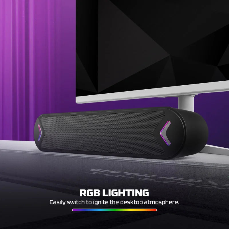 Gaming monitor with a black RGB lighting bar on a desk, featuring text about RGB lighting - LebTech Store