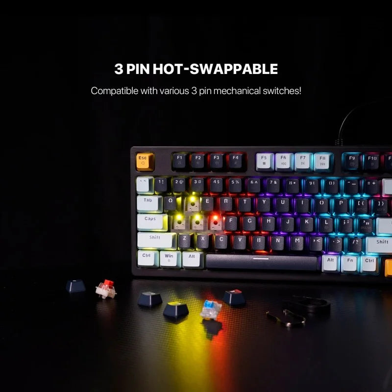 Mechanical keyboard with RGB lighting on a dark background, featuring hot-swappable keys.