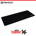 A black Fantech MP64 Basic XL Mousepad from LebTech Store Lebanon. The image shows the extra-long, minimalist desk mat with the Fantech logo in the corner, designed for professional office or gaming setups.