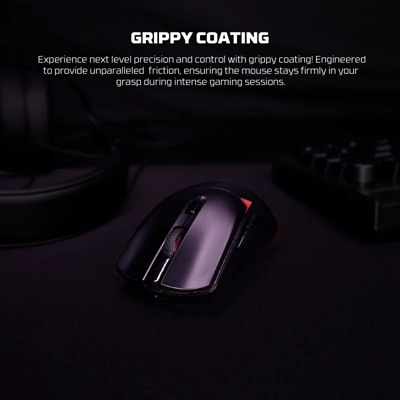 Gaming mouse with grippy coating on a dark surface, surrounded by gaming accessories.