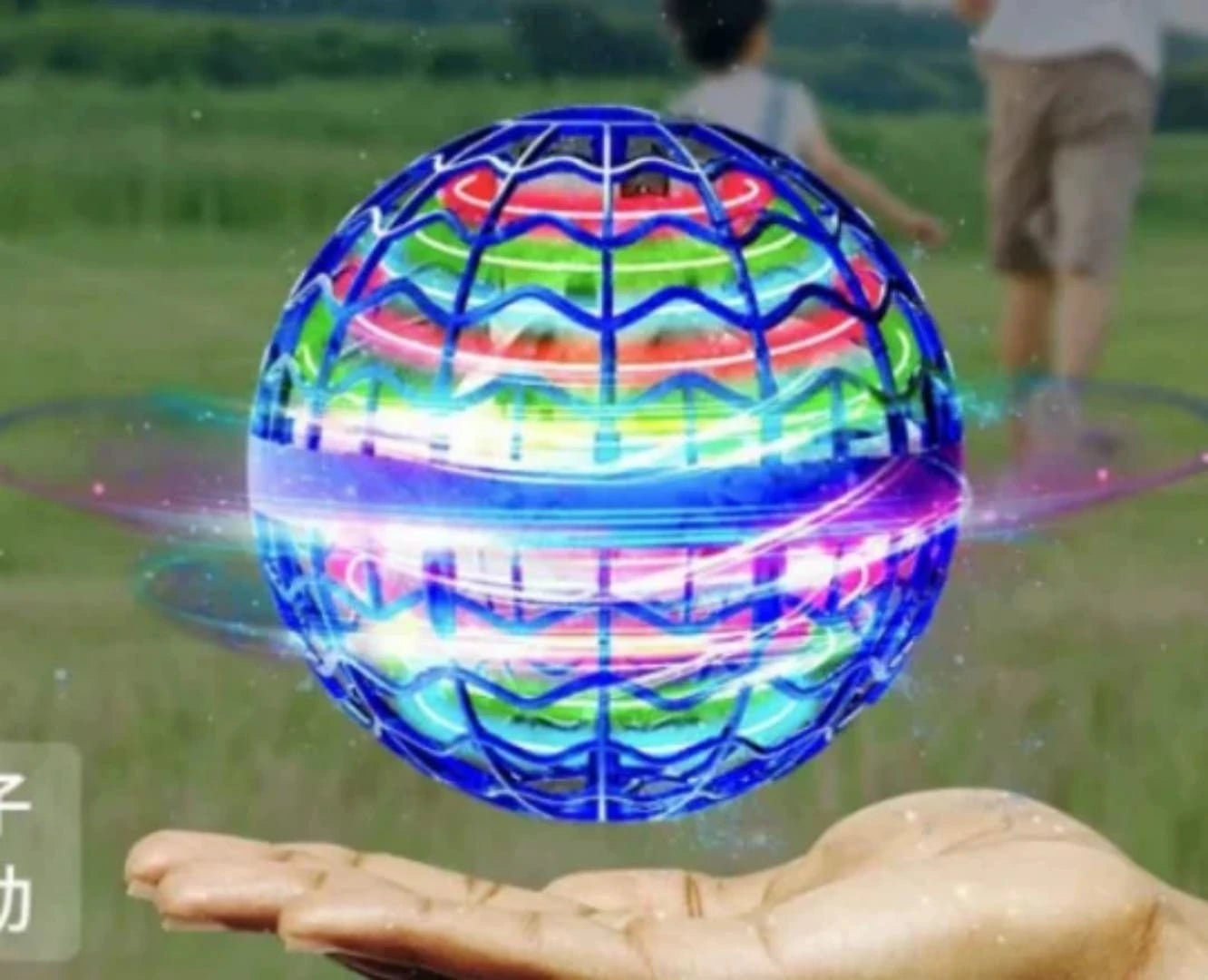 A blue motorized flying boomerang orb ball with glowing neon LED lights hovering right above a hand, available for purchase with fast delivery across Lebanon at LebTech Store.