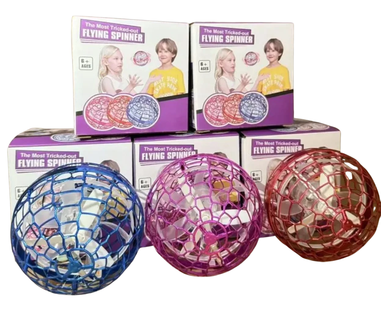 Three motorized flying orb spinner balls in blue, purple, and pink colors next to their product packaging at LebTech Store in Lebanon.
