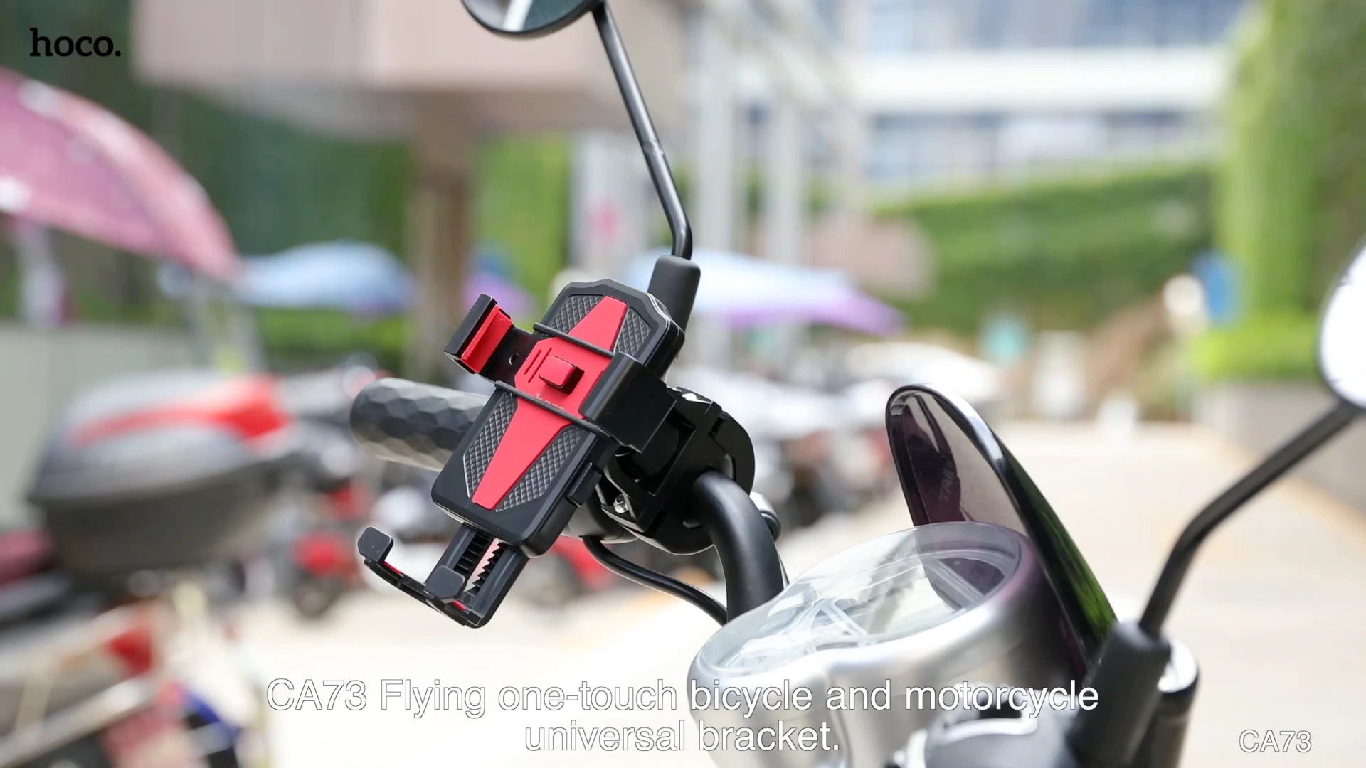 Hoco CA73 Universal Holder mounted onto a motorcycle handlebar near the rearview mirror stem - Lebtech Store - Lebanon