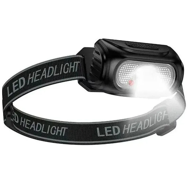 Studio shot of the Hoco DL 24 rechargeable headlamp illuminated with its bright white COB LED light active, featuring an adjustable headband and tilt mechanism, from Lebtech Store with fast delivery across Lebanon.