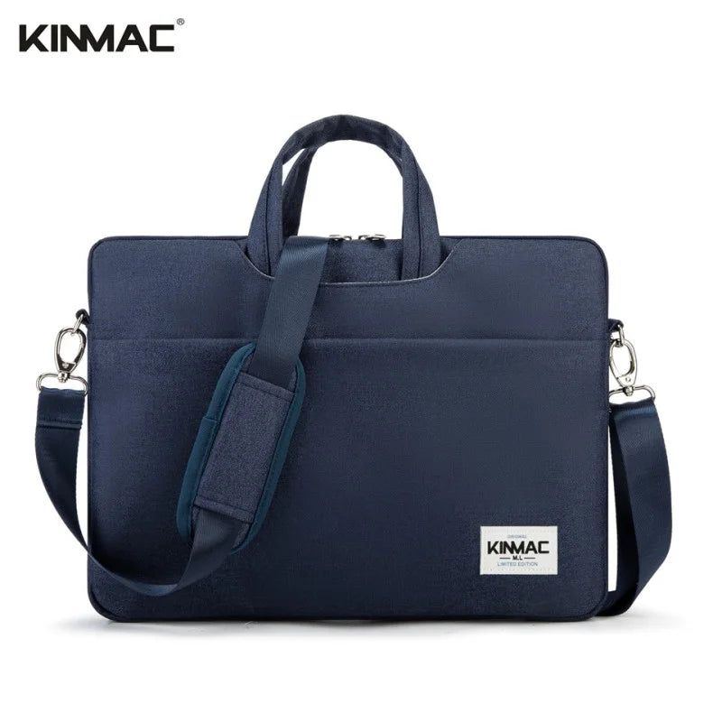 Navy blue laptop bag with shoulder strap and KINMAC branding on a white background
