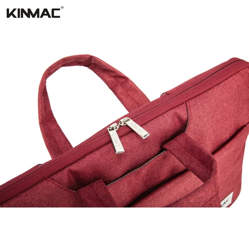 Red bag with a visible brand logo on a white background