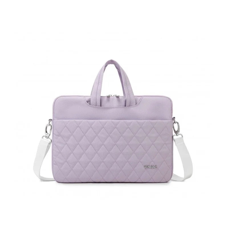 Purple quilted handbag with a white strap on a white background