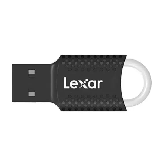 A horizontal close-up view of the black Lexar JumpDrive V40 USB flash drive showing the textured grip casing, clean white logo branding, and built-in key ring loop from Lebtech Store with fast delivery across Lebanon.