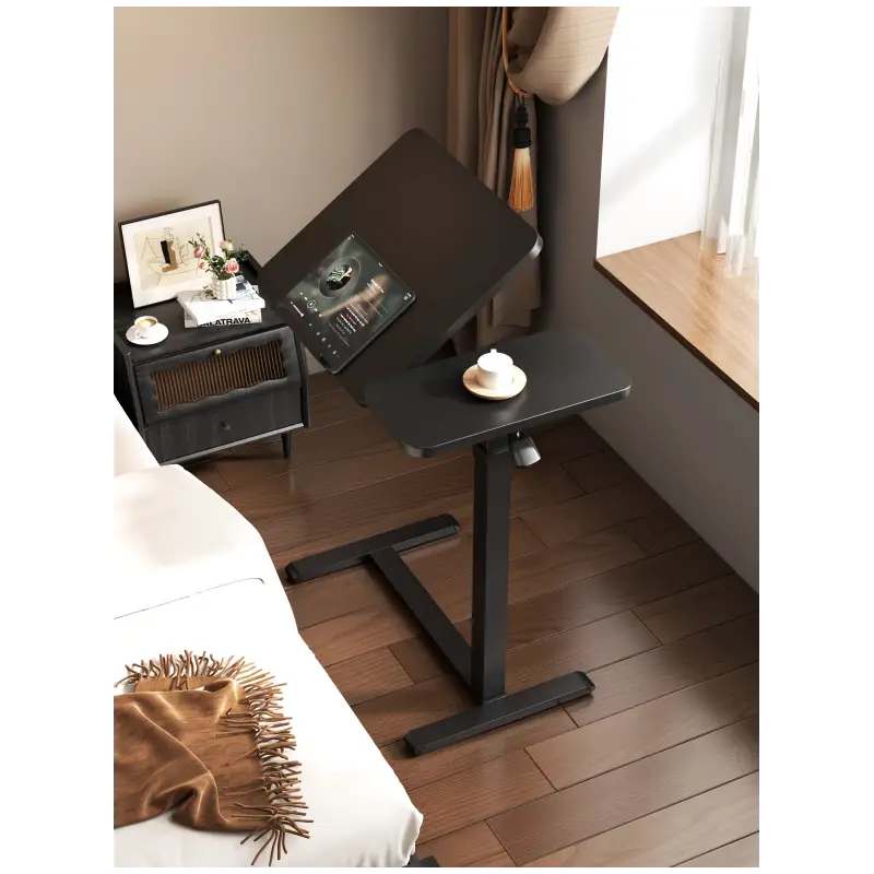 Modern black height-adjustable side table from LebTech Store Lebanon, featuring a split-top design with a tilted tablet surface and a flat side for drinks, perfect for small apartments and home offices across Lebanon.