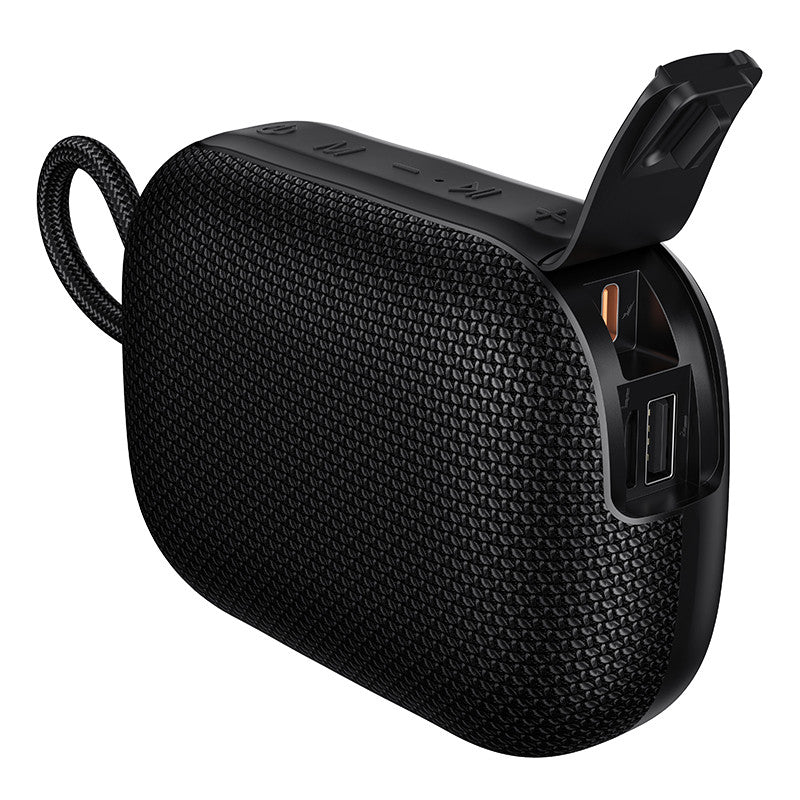 Black portable speaker with textured surface on a white background