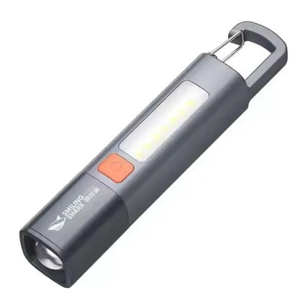 Grey Smiling Shark pocket LED flashlight featuring a bright COB side light strip and integrated carabiner hook from LebTech Store Lebanon.