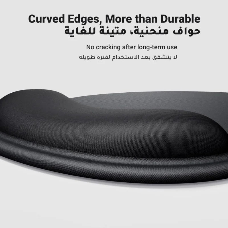 A close-up of the UGREEN ergonomic mouse pad from LebTech Store Lebanon, showcasing its durable curved edges designed to prevent cracking after long-term use. The image includes English and Arabic text highlighting the high-quality construction and longevity of the product.
