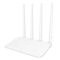 White router with four antennas on a white background